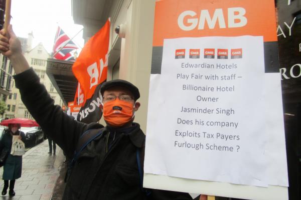 Demo of GMB London Region members outside Edwardian Mayfair Hotel